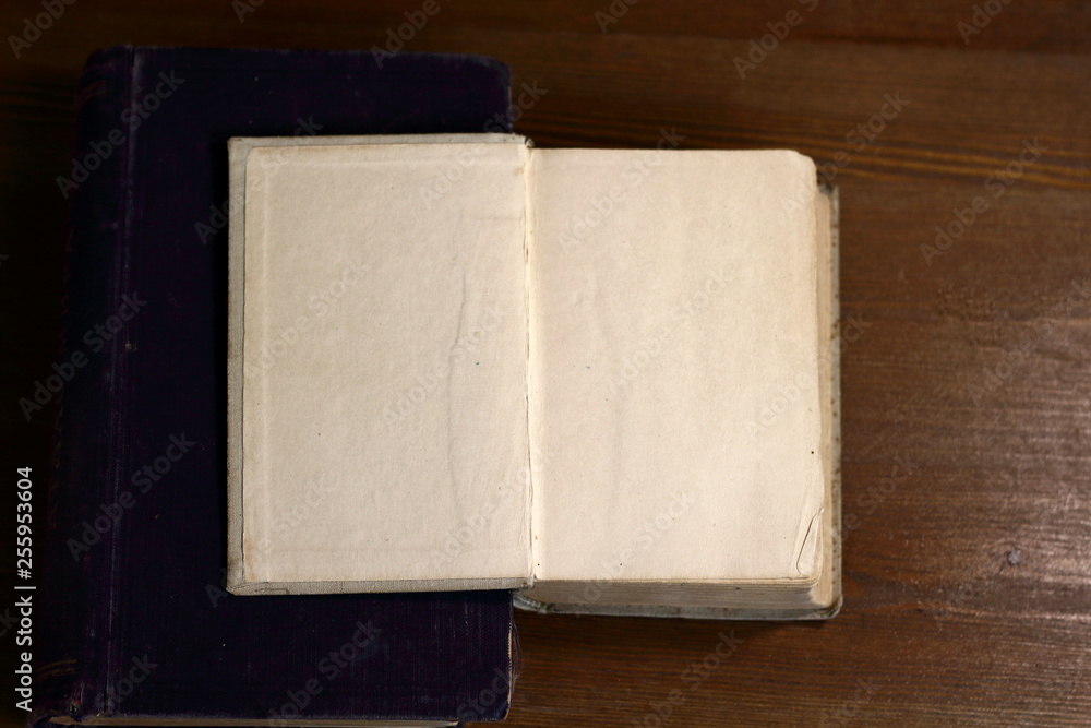 Poster an open old retro book with white blank empty pages on which the designer can write a greeting text 