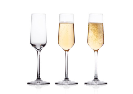 Elegant glasses of yellow champagne with bubbles