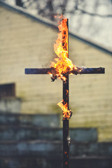 The wooden cross is burning