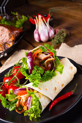 Tasty wraps filled with pulled pork and salad
