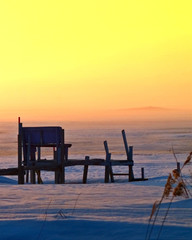 old wooden pier at sunset