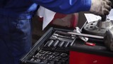 Car mechanic keeping tools polished and clean. Clip
