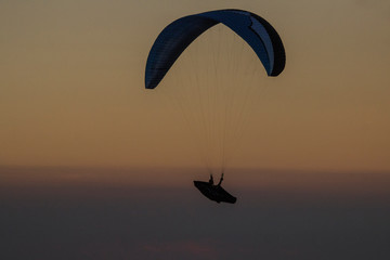paraglider at sunset