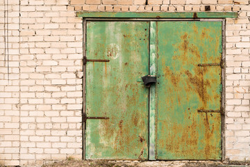 Green rusted metal door