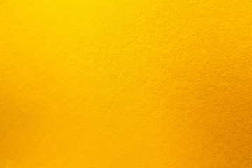 Yellow and orange gold color texture background. Gold texture surface