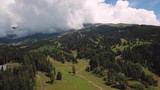 Beautiful valley in Altai mountains, aerial view. Mountain taiga, mountains in the clouds, Altai