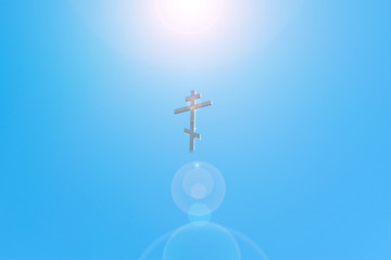 Orthodox cross in the blue sky. Christianity. Religion. Orthodox Christianity. Jesus. Easter. 