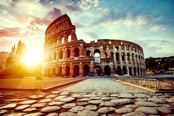 Naklejka na ściany i meble The ancient Colosseum in Rome at sunset
