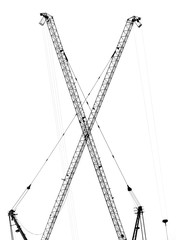 Silhouettes of crane on building