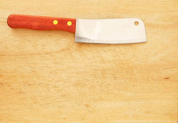 wooden cutting board texture with knife