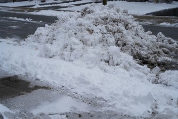Dirty pile of snow, selective focus