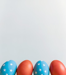american easter Easter eggs painted in the style of the American flag.