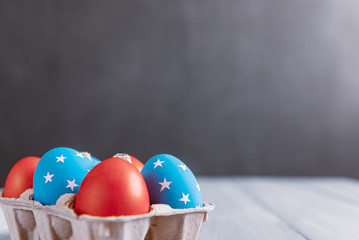 american easter Easter eggs painted in the style of the American flag.