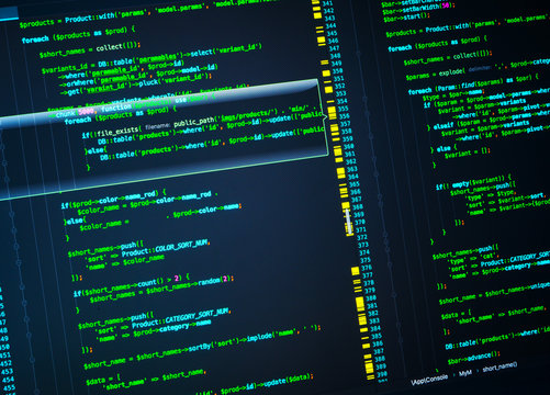 Lines of php coding on the screen. Green code on dark blue background, macro