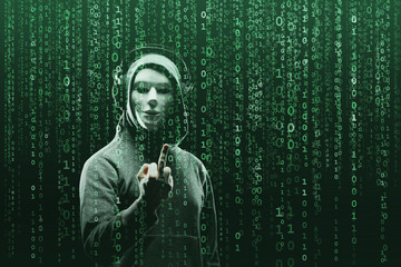 Anonymous computer hacker over abstract digital background. Obscured dark face in mask and hood. Data thief, internet attack, darknet fraud, dangerous viruses and cyber security.