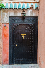 Black door in Marrakech, Morocco
