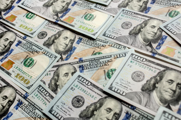 Close up one hundred dollars banknotes background new 2013 edition