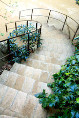 Spiral staircase in the garden. Barcelona architecture.