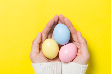 colorful easter eggs on yellow  background