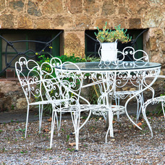 Lovely table with chairs. Rest in the garden.