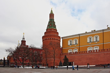 Corner Arsenal tower of Moscow Kremlin on red square and Kremlin wall with Eternal flame, view from the Alexander garden in winter day