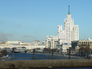 Fototapeta na wymiar View from the bridge on the Garden ring to the Moscow river and Stalin's skyscraper on Kotelnicheskaya embankment