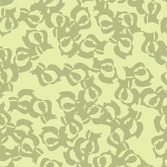 Desert camouflage of various shades of green and yellow colors