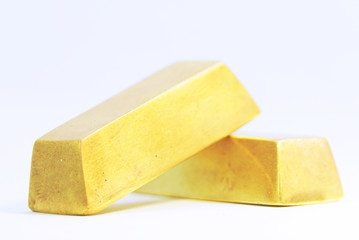 Two gold bars on white background