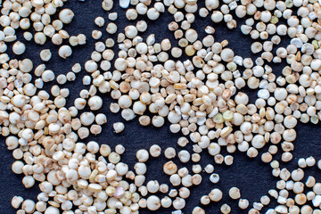quinoa croup  on black surface close up