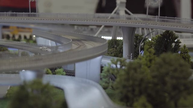 Will travel along the railway bridge, a breadboard model on a scale. The layout of the ground station, close-up