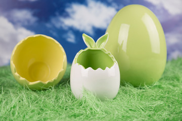 Easter, colorful eggs on a wooden table.