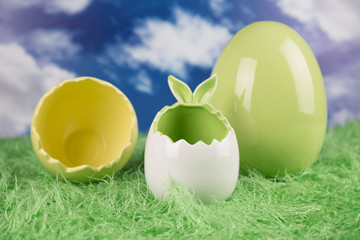Easter, colorful eggs on a wooden table.