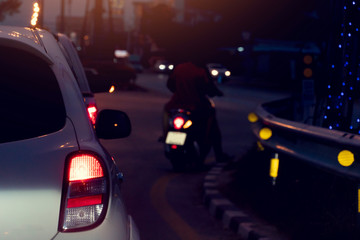 White car on stop on the crossroads at night with open light break.