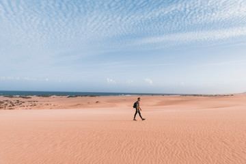 Fototapeta na wymiar man walking outdoors in Fuerteventura, Spain