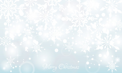 Vibrant defocused background. Bright bokeh with snowflakes. Christmas background with snowflakes and Christmas lights
