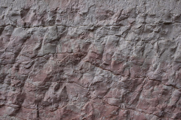 empty ancient raw rough nature pink red stone concrete texture wall for retro restaurant, website, picture frame advertising chart board, home decoration wallpaper fence