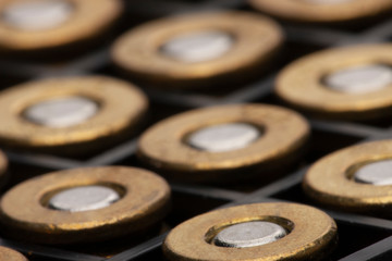 Pile of pistol bullets. The concept of limiting the spread of small arms.