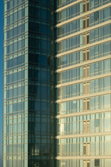 Fototapeta na wymiar Glass Office Building in the Morning Light