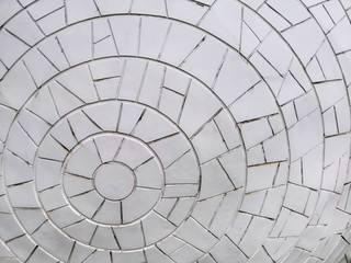 Full Frame Background of White Circular Pattern Tiled Wall