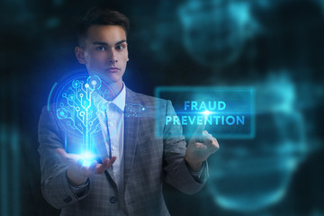 The concept of business, technology, the Internet and the network. A young entrepreneur working on a virtual screen of the future and sees the inscription: Fraud prevention
