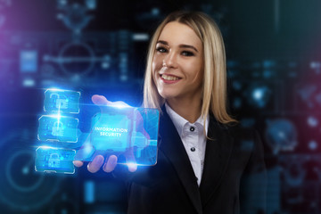 The concept of business, technology, the Internet and the network. A young entrepreneur working on a virtual screen of the future and sees the inscription: Information security