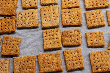 Homemade baked parmesan cheesse crackers with rosemary