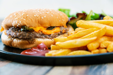 Cheese burger - American cheese burger with Golden French fries