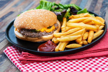Cheese burger - American cheese burger with Golden French fries