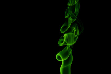 Abstract backgrounds and wallpapers. Colorful smoke on black background.