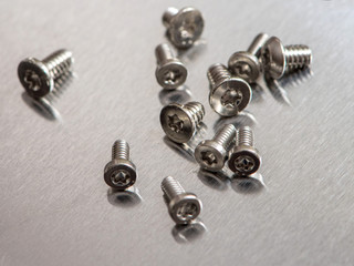 Bolts closeup on a gray background.