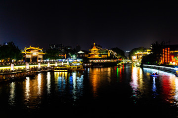 Fototapeta na wymiar Nanjing, Jiangsu, China: Qin Huai river in the area around Confucius temple scenic area is one of the top touristic places in Nanjing and is beautifully lighted at night