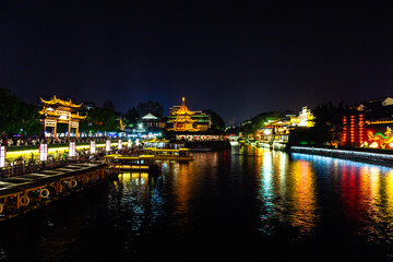 Fototapeta na wymiar Nanjing, Jiangsu, China: Qin Huai river in the area around Confucius temple scenic area is one of the top touristic places in Nanjing and is beautifully lighted at night