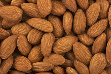 Almonds background. Full frame shot of almonds for sale in market. Copy space for your text.