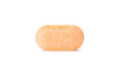 Vitamin C tablet isolated on white background